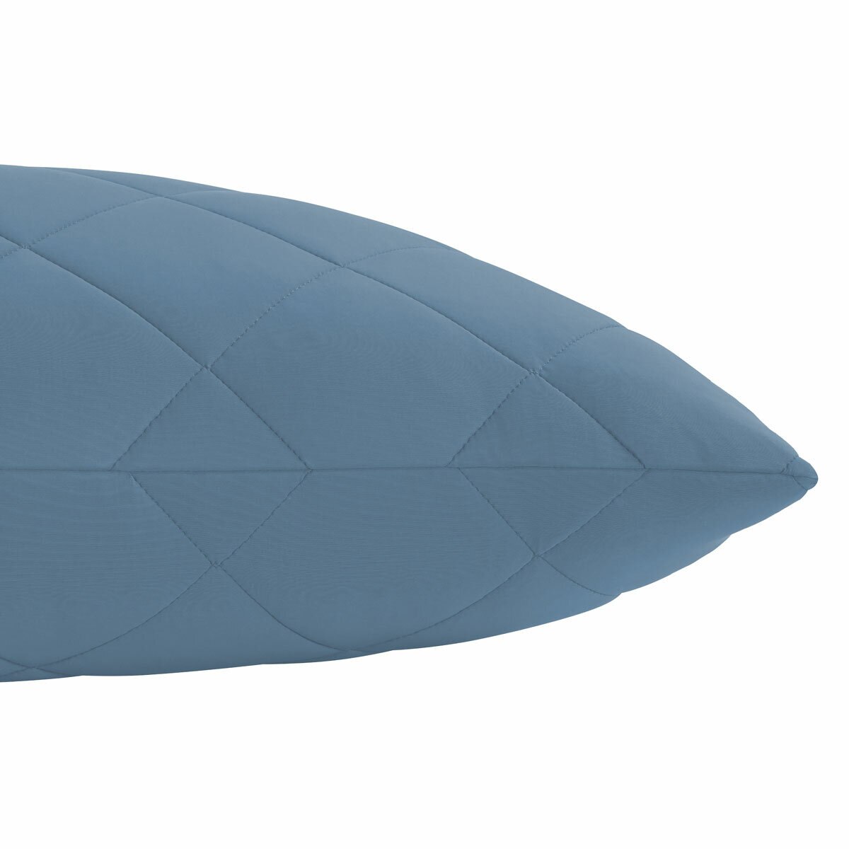 Quilted light blue body pillow with diamond stitching placed in front of two white pillows on a neatly Quilted light blue body pillow with diamond stitching placed in front of two white pillows on a neatly