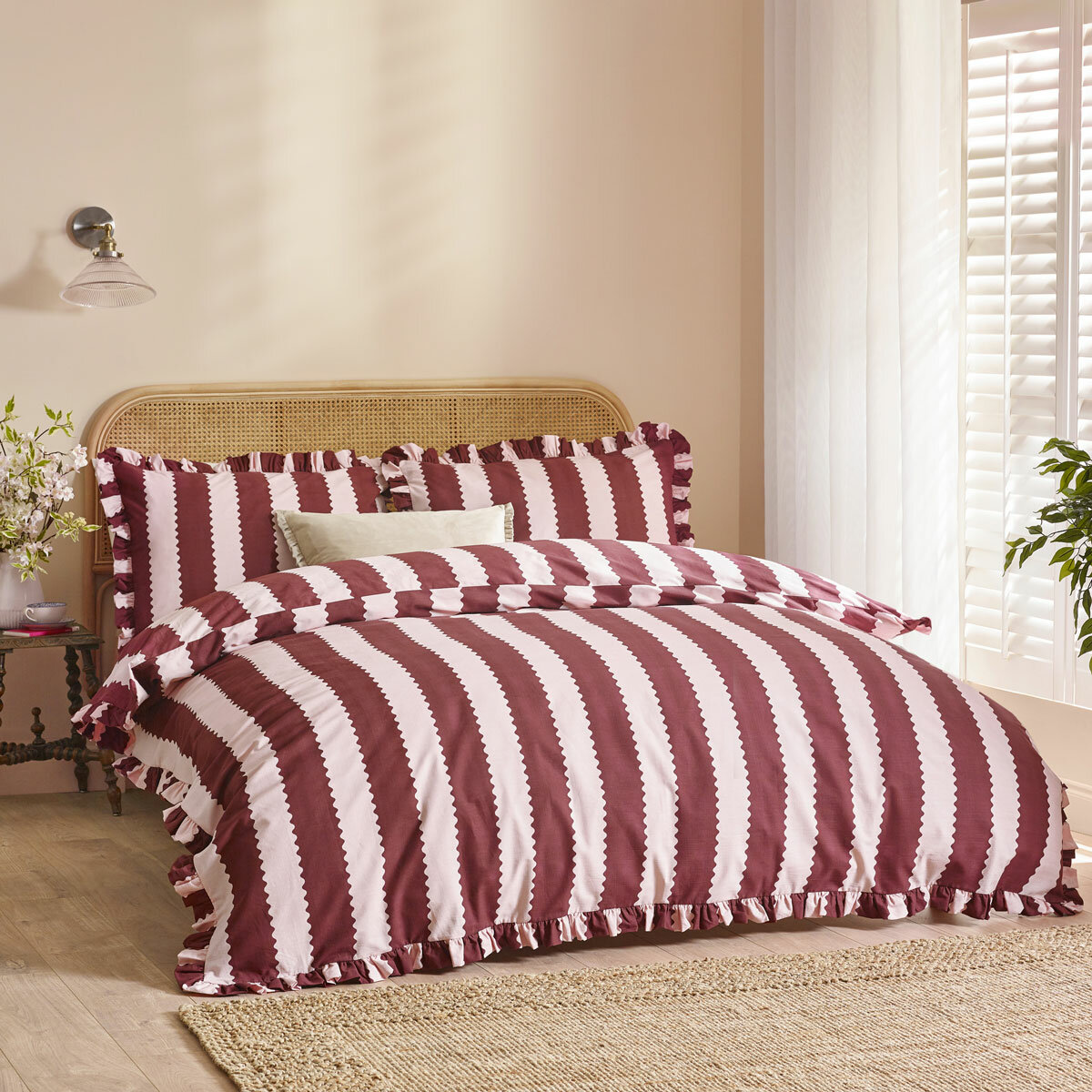 Yellow and white striped duvet set with scalloped detailing and matching pillow shams. Yellow and white striped duvet set with scalloped detailing and matching pillow shams.