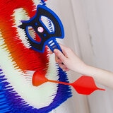 Lifestyle image of someone throwing an axe at the board Lifestyle image of someone throwing an axe at the board