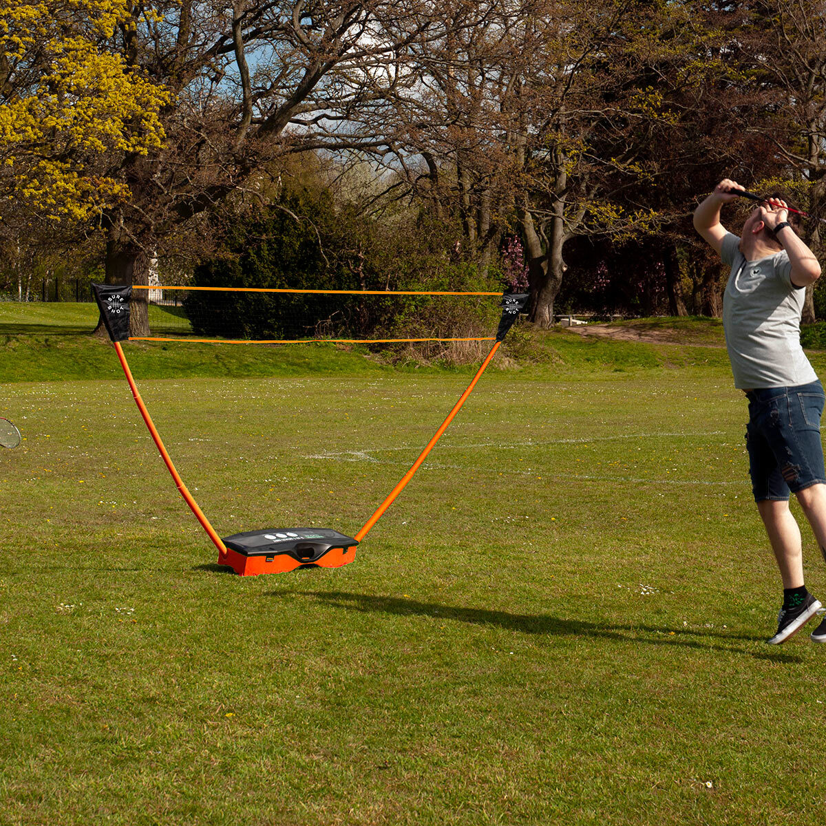 Lifestyle image for a game of Badminton using the Sureshot 3 in 1 Garden set