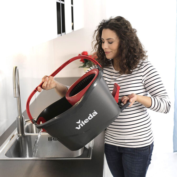 Pouring Water into a Sink