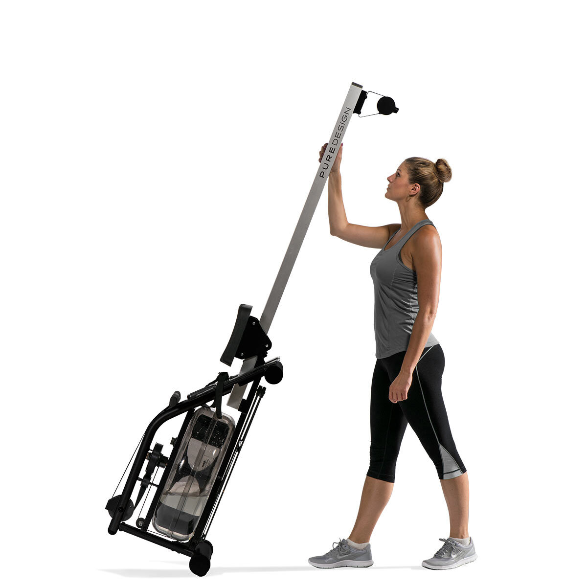 image of person holding rower upright