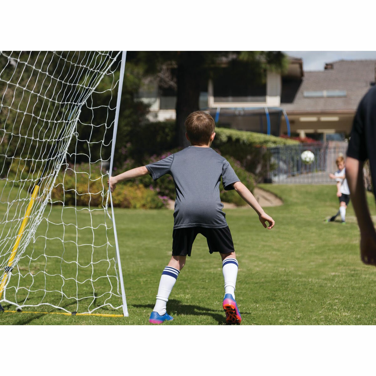 Lifestyle image of a child in the goal Lifestyle image of a child in the goal