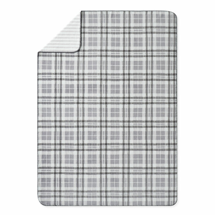 Grey floral throw, folded completely with a plain white background