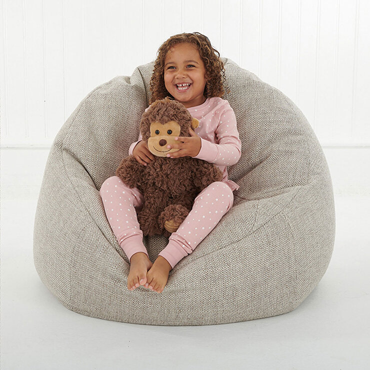 Girl Sitting Down Cuddling Monkey Girl Sitting Down Cuddling Monkey