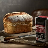 Loaf of Bread on a Board