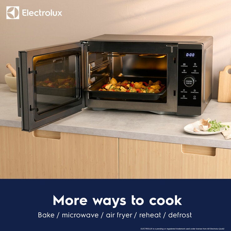 Lifestyle showing features of the microwave Lifestyle showing features of the microwave