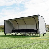 Lifestyle image of the Quickplay Pro Alu Club Shelter 16 x 6ft with chairs underneath (not included)