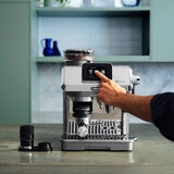 Lifestyle images of De'Longhi La Specialista Touch Coffee Machine on a kitchen countertop