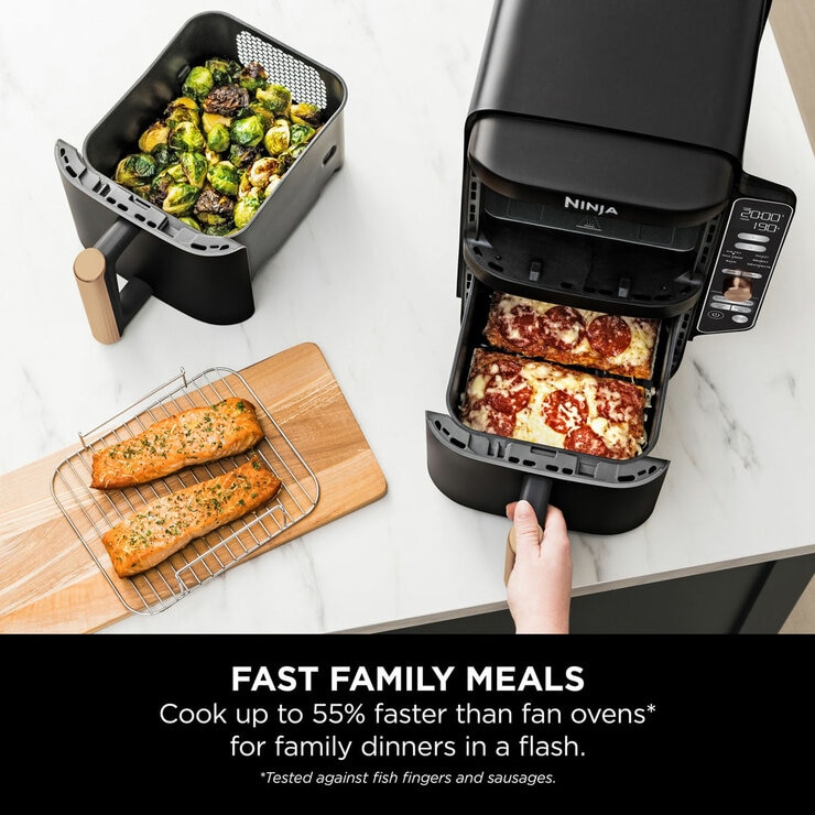 Lifestyle image of Ninja Double Stack 9.5L Air Fryer cooking family meals