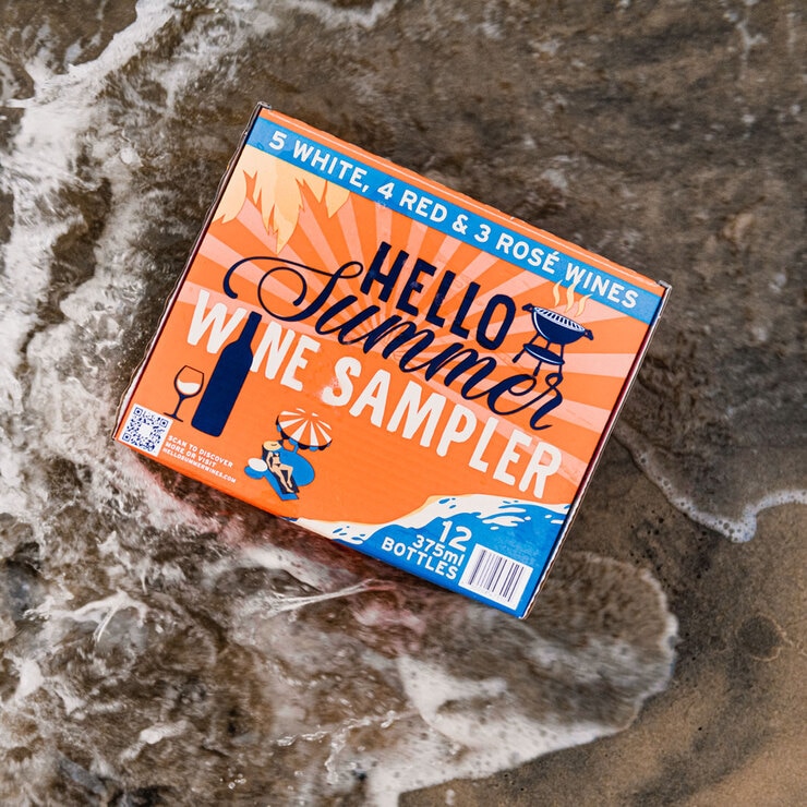 Lifestyle image of box on the beach in the waves Lifestyle image of box on the beach in the waves