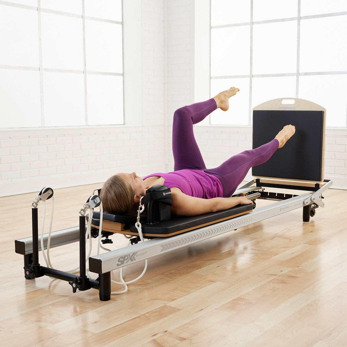 At Home SPX Reformer Package with Jumpboard and Mat Converter by Merrithew®/STOTT PILATES®
