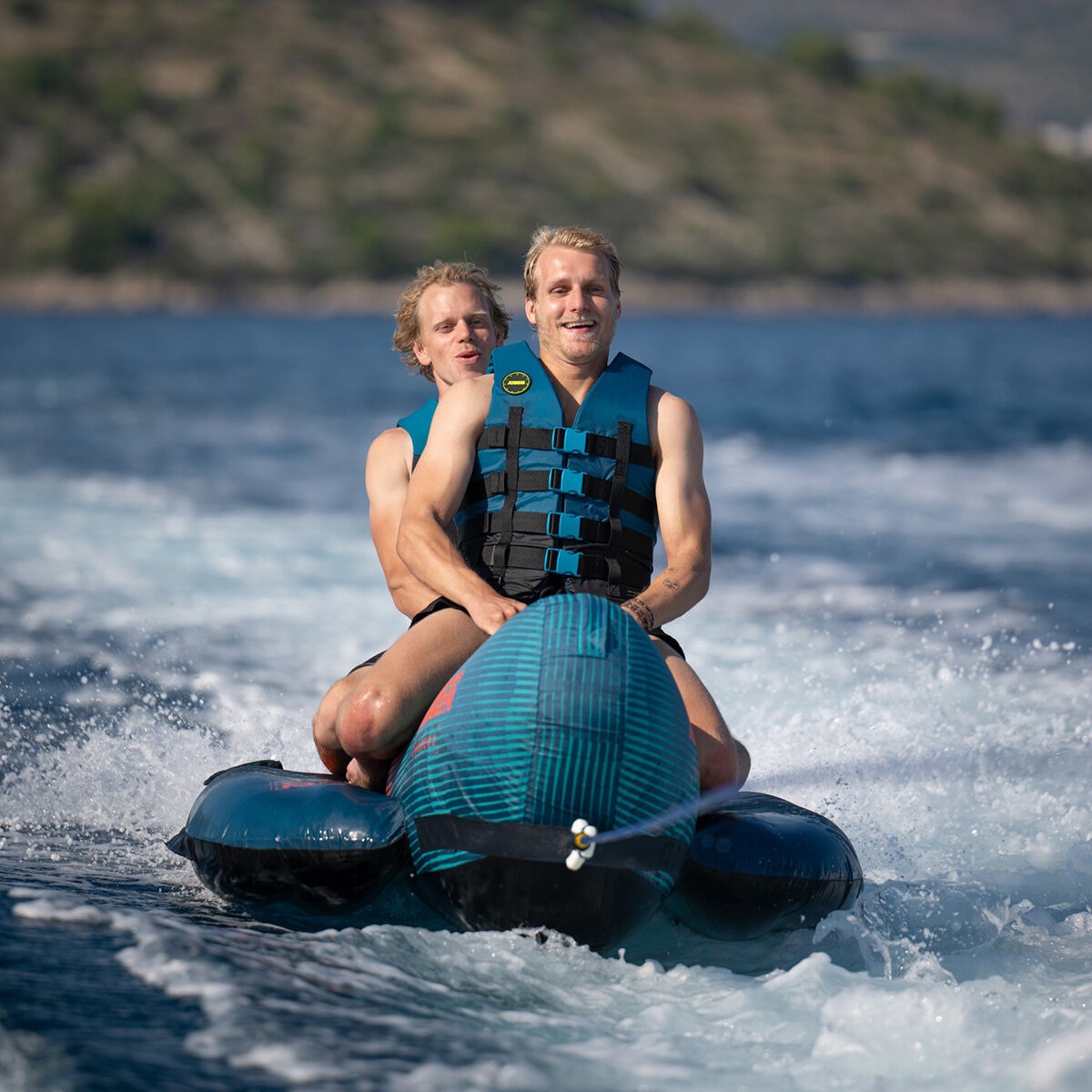 Lifestyle image of two men riding the Jobe Chaser