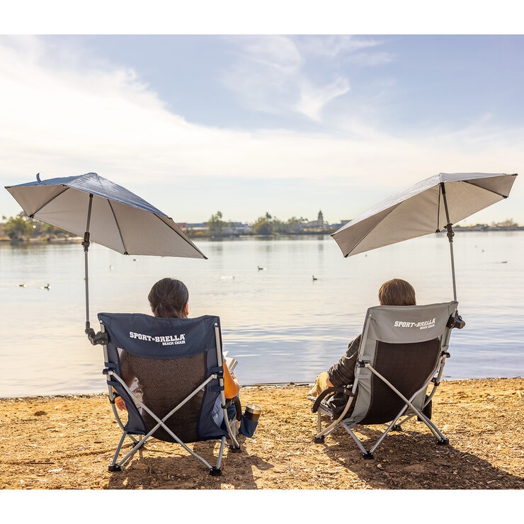 Lifestyle image of two people sat in the beach chairs