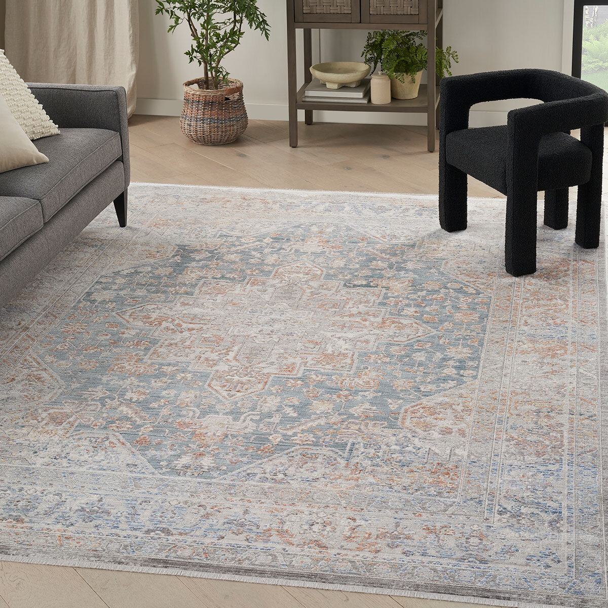 Elegant heirloom rug, tradtional design in blue, grey, rust and ivory tones