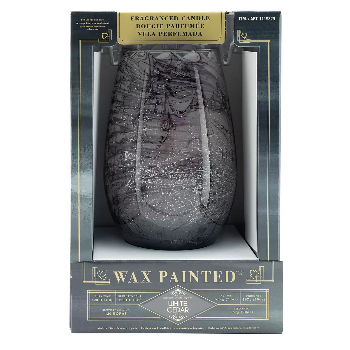 Lifetsyle image of grey candle in packaging face on
