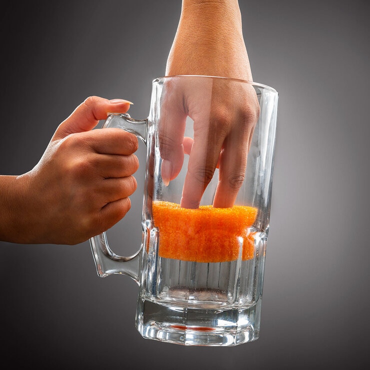 Scrub Daddy FlexTexture Scrubber cleaning a glass