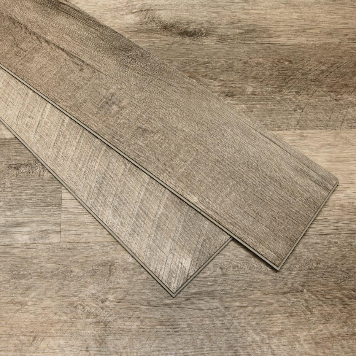 Close up image of flooring with two loose planks