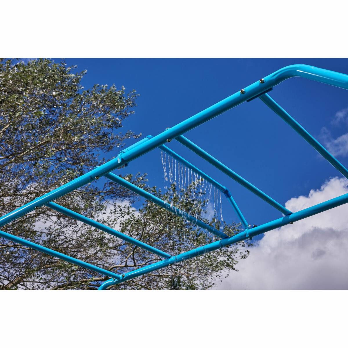 Lifestyle image of the monkey bars with sprinkler above Lifestyle image of the monkey bars with sprinkler above