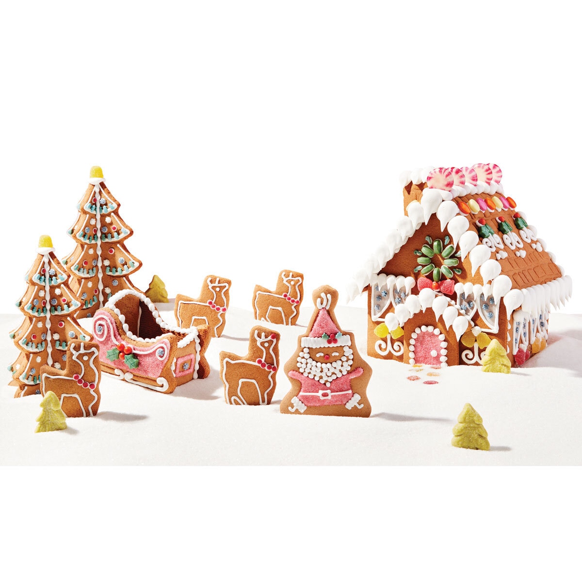 all the parts of the gingerbread house kit outside of the box