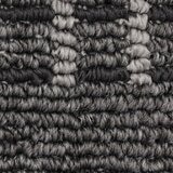 Close up of runner rug with grey geometric pattern