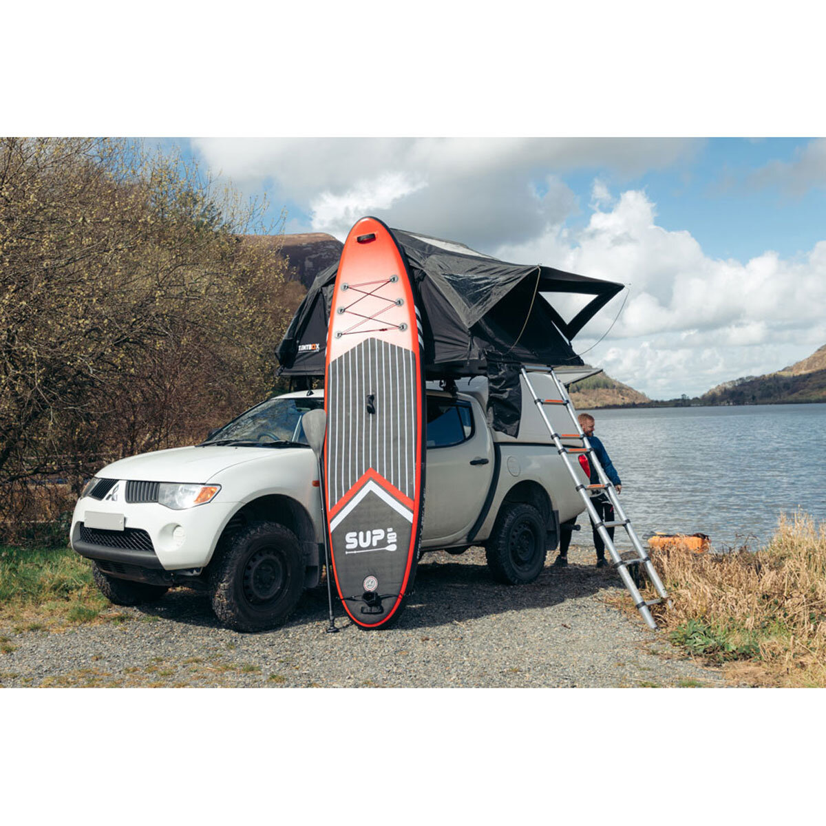 Lifestyle image of tentbox on pickup infront of lake
