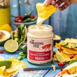 lifestyle shot of mayo with chip being dipped