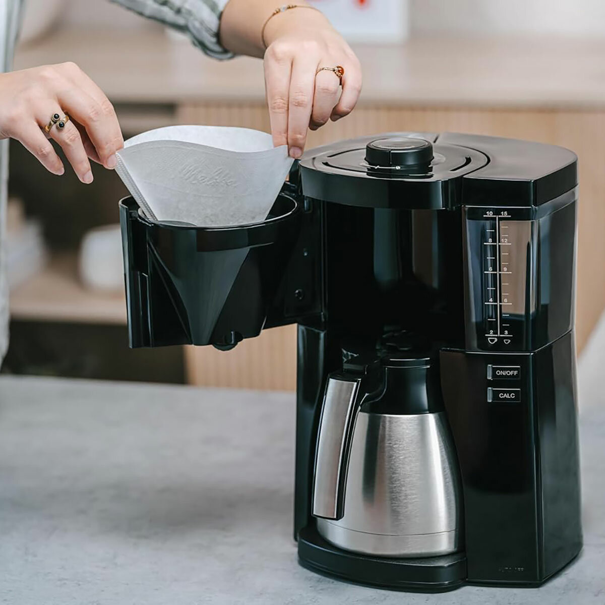 Lifestyle image of Melitta LOOK V therm Coffee Maker with coffee filter paper inserted