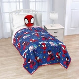 Imagery of Marvel Spiderman blanket/pillow set styled on bed