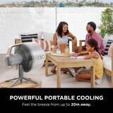 Lifestyle image of  Shark FlexBreeze Pro Mist Indoor & Outdoor Fan & Outdoor Misting System with powerful portable cooling