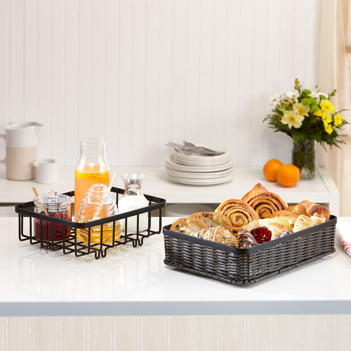 Lifestyle image of pastries in both baskets out of frame