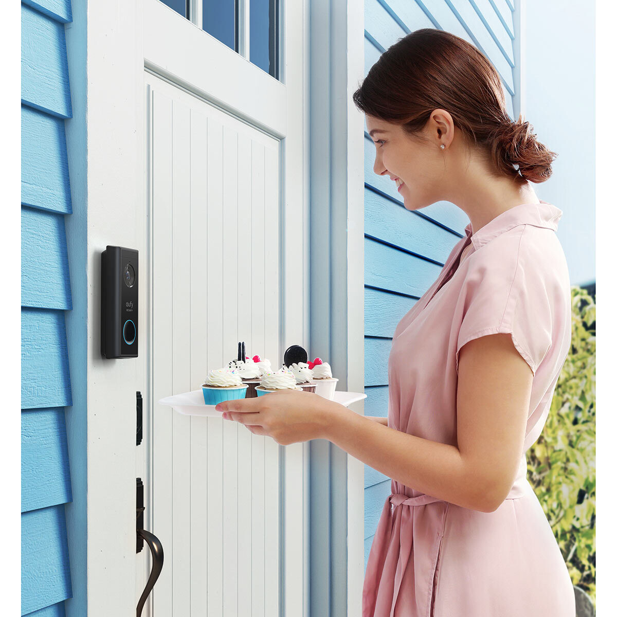 Lfestyle image of woman atdoor with cakes