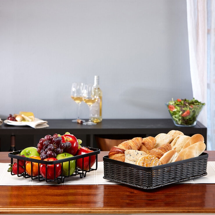 Lifestyle image of fruit in both baskets out of frame Lifestyle image of fruit in both baskets out of frame