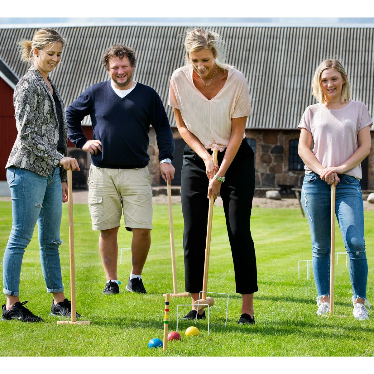 Lifestyle image of people playing Croquet Lifestyle image of people playing Croquet