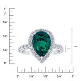 Pear Shaped Lab Emerald and 0.65ctw Diamond Ring.