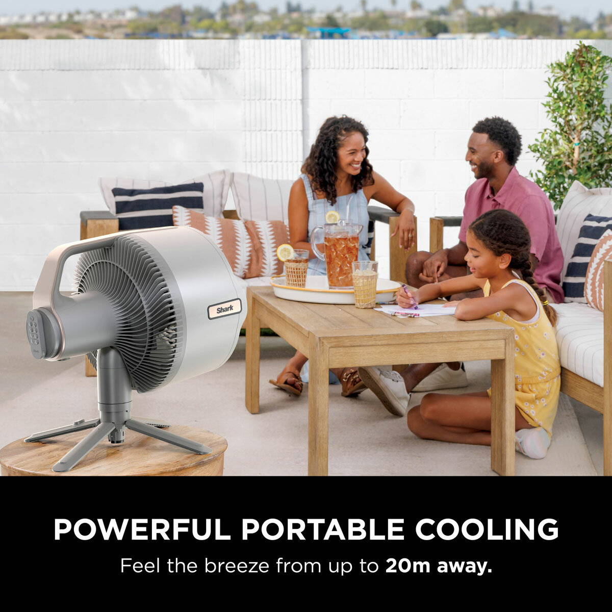 Lifestyle image of  Shark FlexBreeze Pro Mist Indoor & Outdoor Fan & Outdoor Misting System with powerful portable cooling