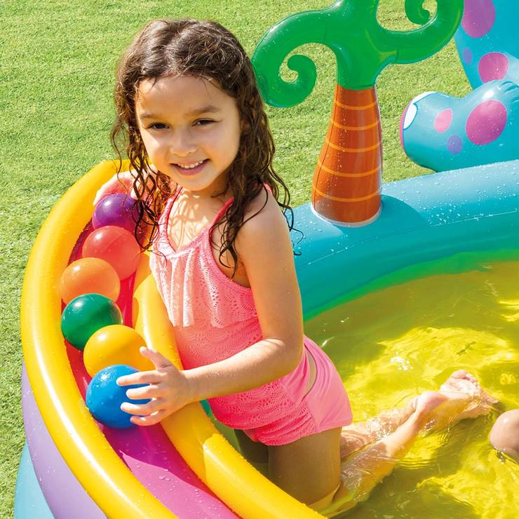 Child playing in Dinoland kids pool