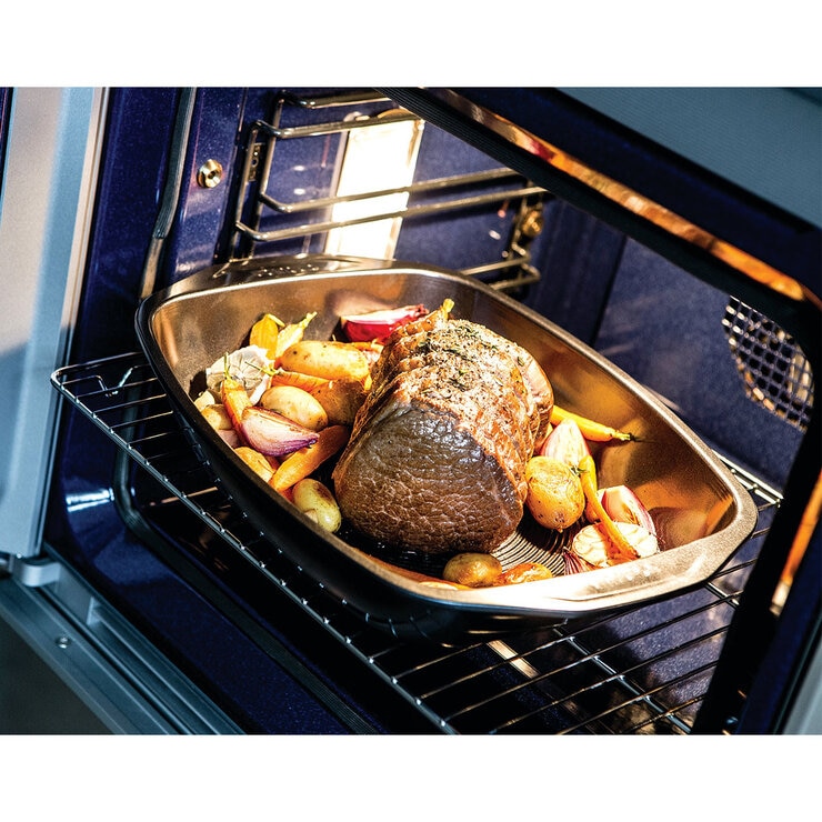 Circulon Momentum Roasting pan lifestyle with food in oven Circulon Momentum Roasting pan lifestyle with food in oven