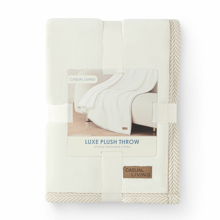 Folded Ivory throw in packaging Folded Ivory throw in packaging