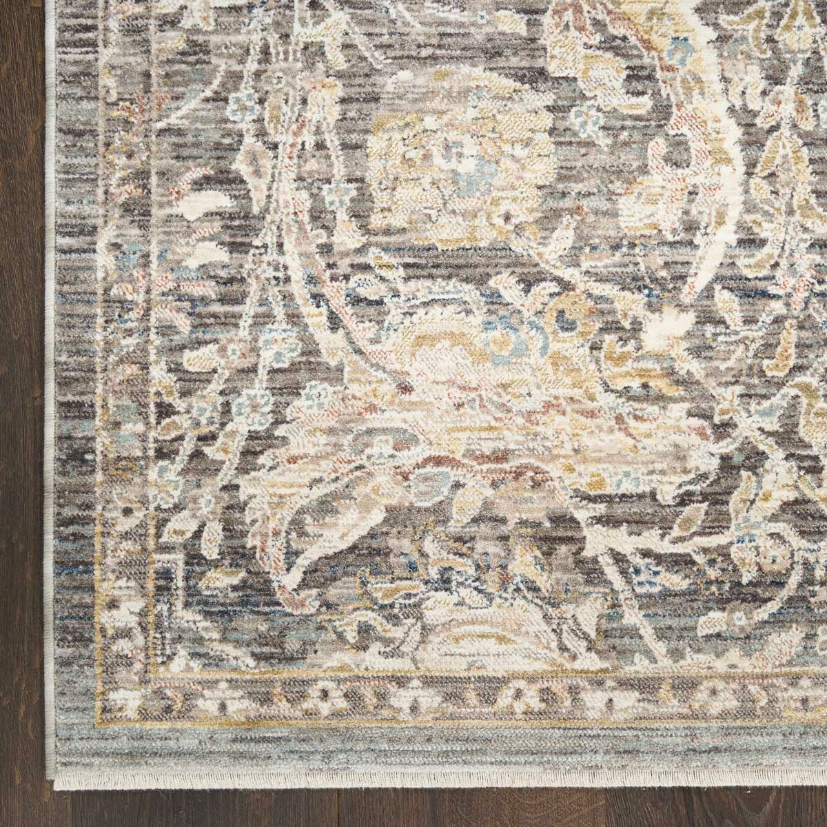 Grey and beige rug with detailed symmetrical pattern and vintage-style accents Grey and beige rug with detailed symmetrical pattern and vintage-style accents