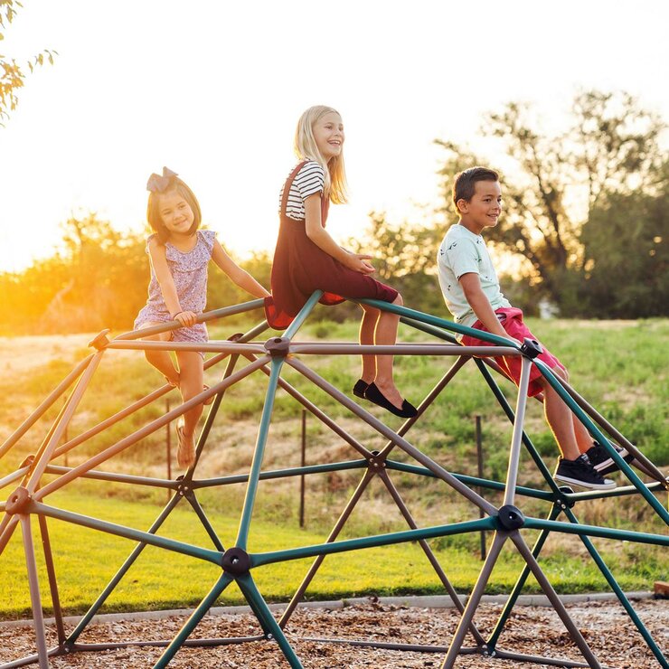 Lifestyle image of children sat on the Dome Climber