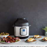 Lifestyle image of Instant Pot Duo Crisp 8 with steak and shepherds pie