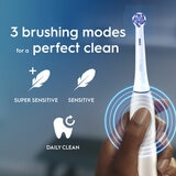 Lifestyle image of Oral-B iO2 Electric Toothbrush with 3 brushing modes
