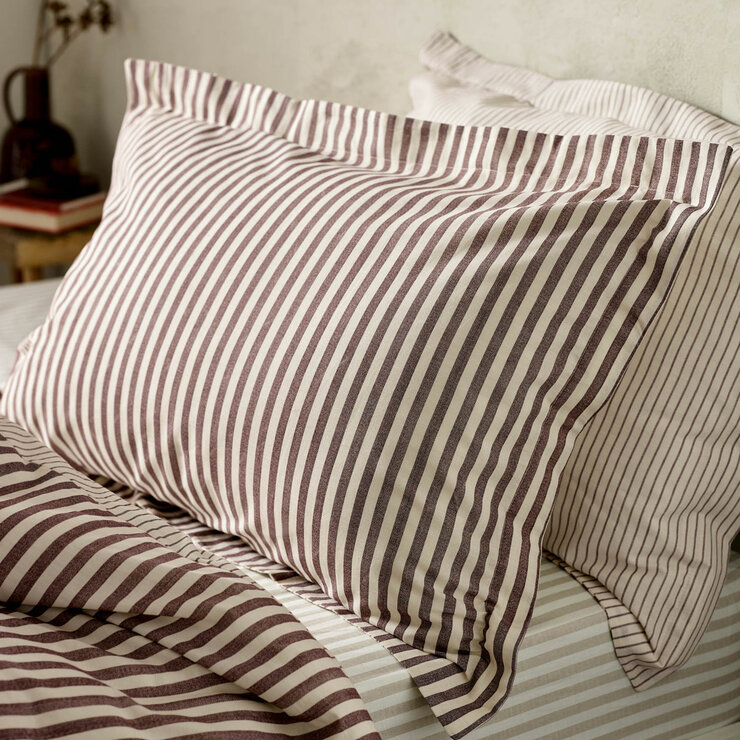 Striped duvet set with vertical burgundy and white lines, paired with matching pillowcases