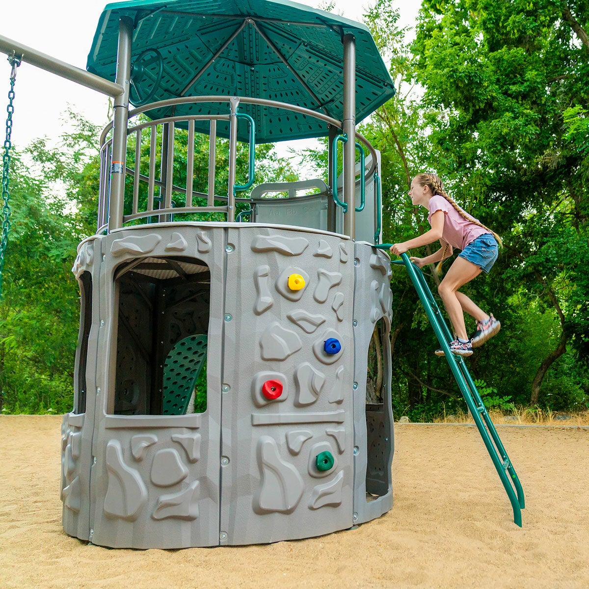 Lifestyle image of a child climbing the ladder Lifestyle image of a child climbing the ladder