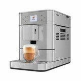 Slanted image of coffee machine making cappucino