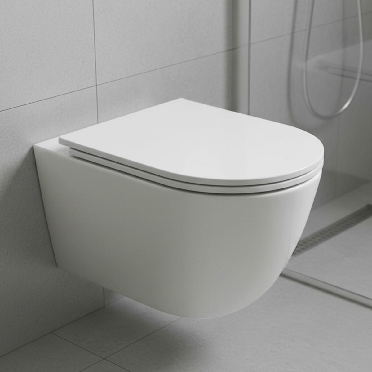 Tavistock Curve Wall Hung Toilet With Pan And Slim Seat Tavistock Curve Wall Hung Toilet With Pan And Slim Seat