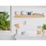 Lifestyle image of chime plugged in a kitchen setting