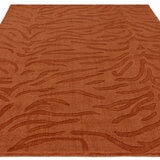 Asiaitc Tigra Rug in burnt orange colour with tiger print pattern Asiaitc Tigra Rug in burnt orange colour with tiger print pattern