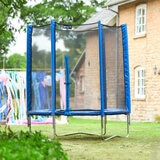 Lifestyle image of the Plum 1.8m Blue Springsafe Trampoline
